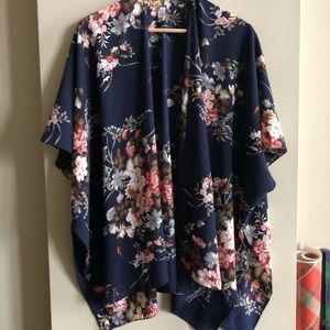 Floral navy poncho from Charming Charlie